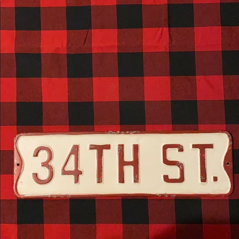 Miracle on 34th Street sign. Metal